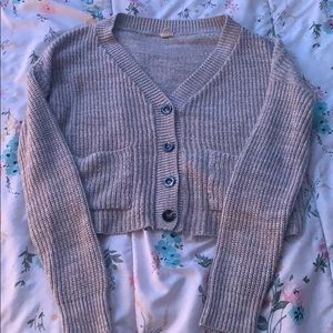 Cropped buttoned down knit sweater